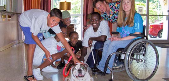 service dog helping person with disabilities